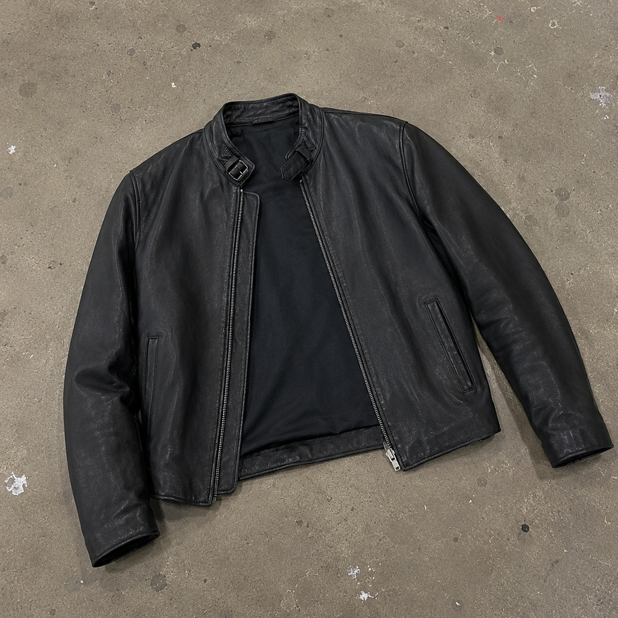 Phone photo of jacket on the ground